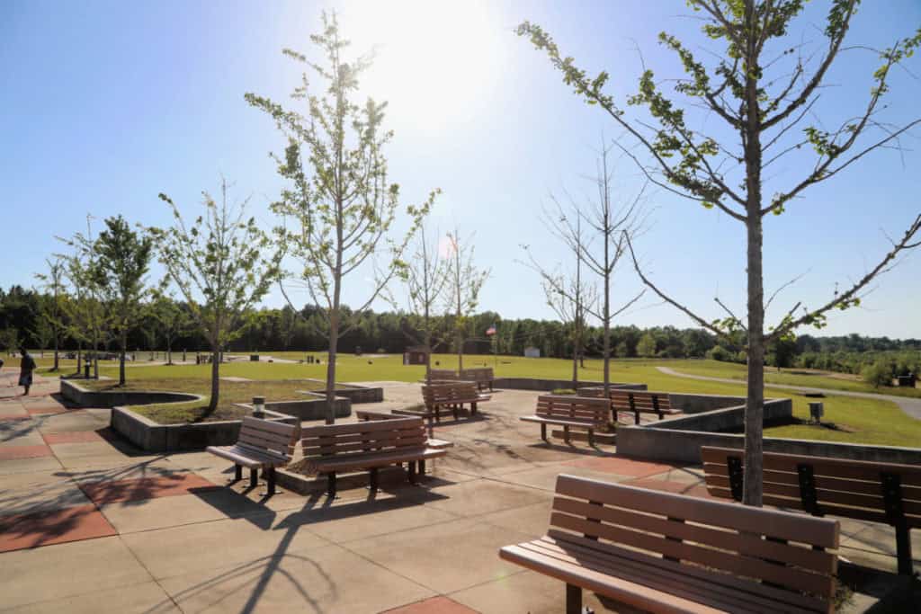 Hilltop Parking area with a pedestrian path and overlook at Tuskegee Airmen National Historic Site