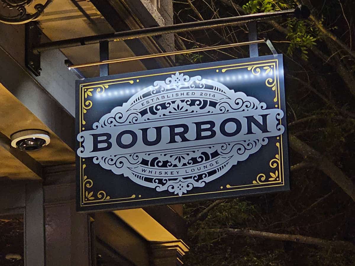 Bourbon sign hanging from a building