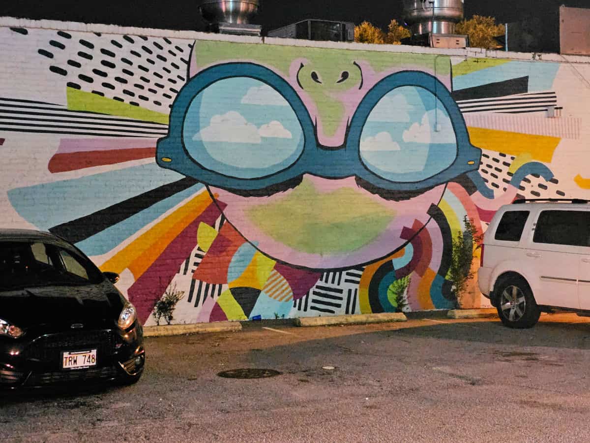 street mural between two cars