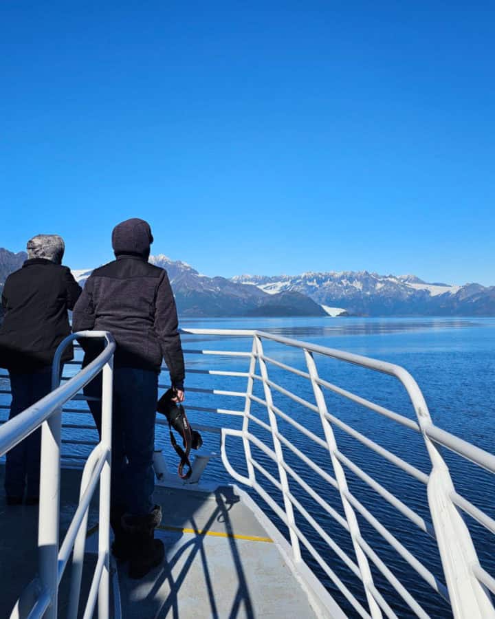 enjoying the scenery on the Orca Voyager on Kenai Fjords Tours