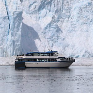 Glacier Explorer from Kenai Fjords Tourssailing in front of Aialik Glacier in Kenai Fjords National Park