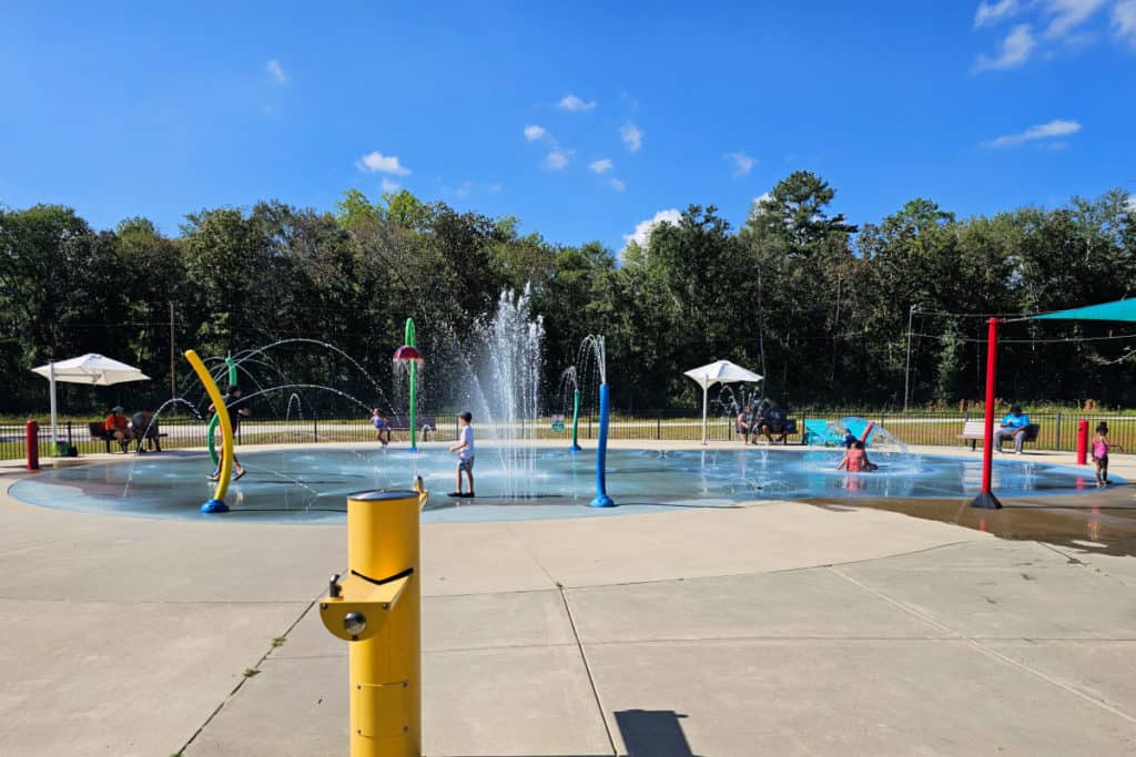 Kids having fun at splash pad in Sesquiccentennial State Park