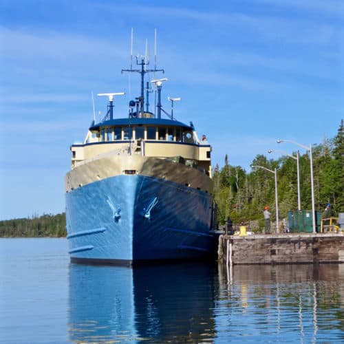 The Ranger III is parked at the Rock Harbor dock preparing to depart. Photo Credit NPS