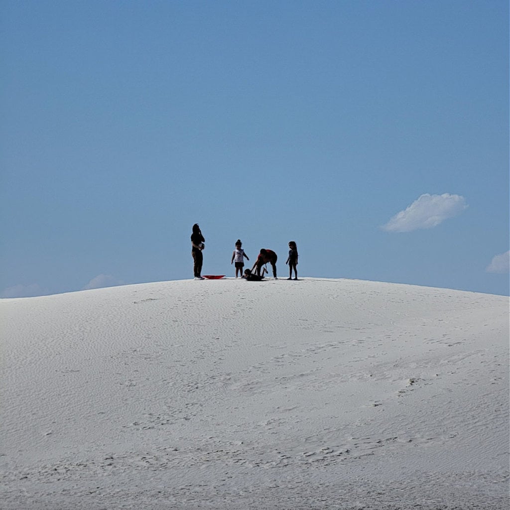 sand sledding at White Sands National Park